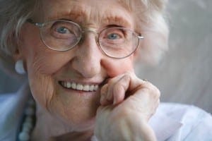 happy old woman with glasses